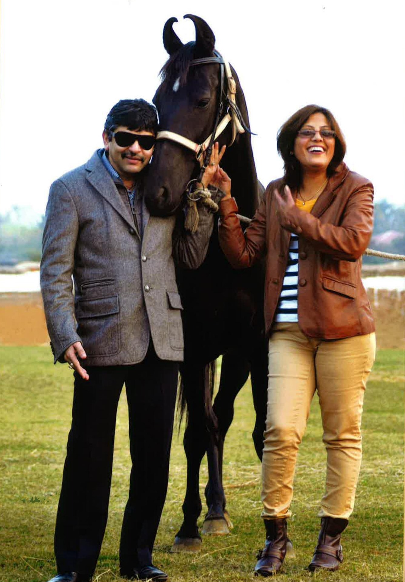 <strong>Rejesh Satiija</strong> and Renu <strong>Satiija</strong> with a horse